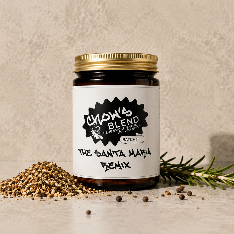 Jar of 'Chow's Blend' with spices and rosemary on a neutral background