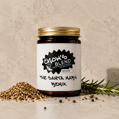 Jar of 'Chow's Blend' with spices and rosemary on a neutral background
