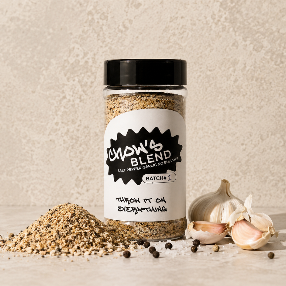 Spice jar with 'Mow & Blend' label on a neutral background